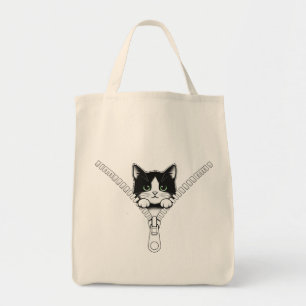 Lustige Katze Kitten schaut heraus Tragetasche