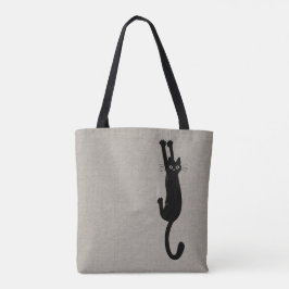 Lustige schwarze Katze, die an | humorvoller Tasche