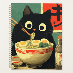 Lustige schwarze Katze, die Ramen isst Planer