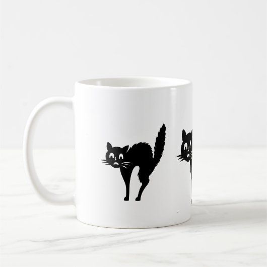 lustige schwarze Katze mit einem gewölbten Rücken Kaffeetasse (Links)