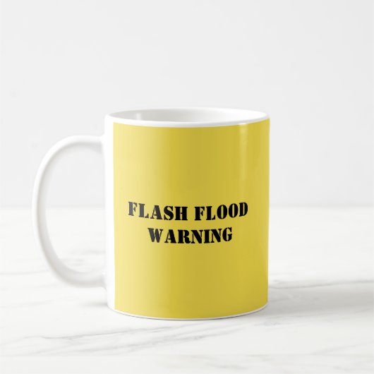 Lustige Tasse liest "GRELLE FLUT-WARNING " (Links)