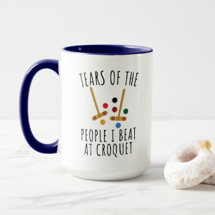 Lustige Tränen der Leute, die ich bei Croquet besi Tasse
