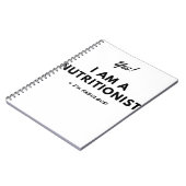 Lustiger Ernährungswissenschaftler-schwarzes u. Notizblock (Linke Seite)