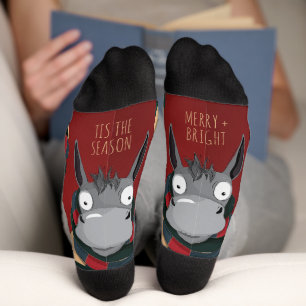 Lustiger Esel-Cartoon mit festlichen Streifen auf  Socken