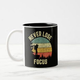 Lustiger Fotograf verliert nie den Fokus Zweifarbige Tasse