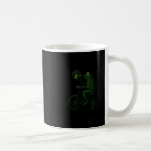 Lustiger Froschzauberer bricht auf, um Narretei zu Kaffeetasse