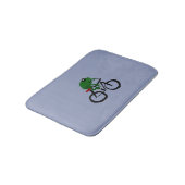 Lustiger grüner Frosch, der Fahrrad fährt Badematte (Schrägansicht)