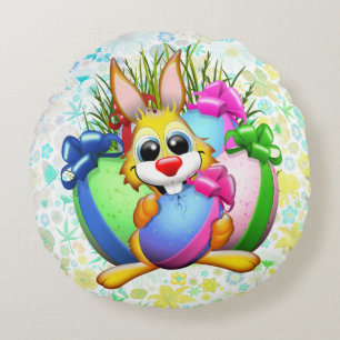 Lustiger Hase, der ein Osterei beißt Rundes Kissen