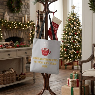 Lustiger heißer Kakao und festliche Weihnachtsstim Tasche