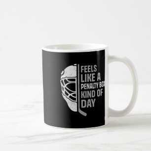 Lustiger Hockeyspieler fühlt sich wie eine Strafbo Kaffeetasse