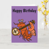 Lustiger Hummer, der Banjo-Cartoon spielt Karte (Gelbe Blume)