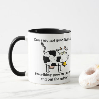 Lustiger Kuh-Witz in einem Ohr heraus das Euter Tasse
