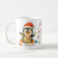 Lustiger Pinguin in Lichter-Tasse steckt