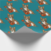 Lustiger Rotluchs, der Gitarren-Kunst spielt Geschenkpapier (Ecke)