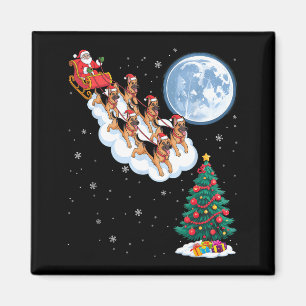 Lustiger Santa reitet auf deutschem Schäferhund Ba Magnet