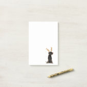 Lustiger schwarzer Labrador mit Post-it Klebezettel (Auf Schreibtisch)