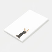 Lustiger schwarzer Labrador mit Post-it Klebezettel (angewinkelt)