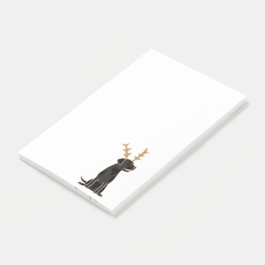 Lustiger schwarzer Labrador mit Post-it Klebezettel (angewinkelt)