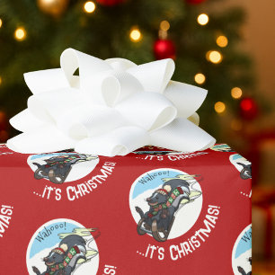 Lustiger Skunk auf einem Schlitten Wahoo! Es ist W Geschenkpapier