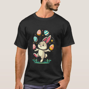Lustiger süßer Osterhase jongliert bunte Eier Kind T-Shirt