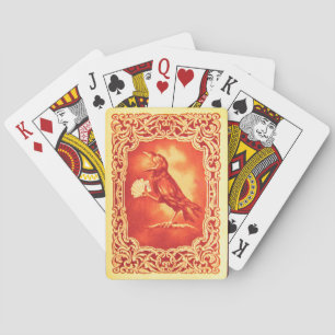 Lustiger Vintage roter Krähe spielt Spielkarten