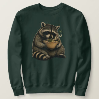 Lustiger Waschbär trinkt heiße Suppe Sweatshirt