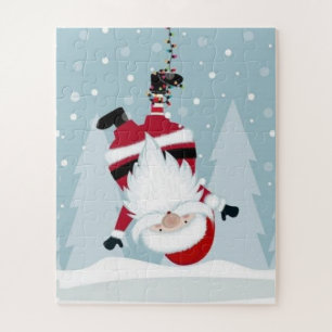 Lustiger Weihnachtsmann hängt kopfüber Puzzle