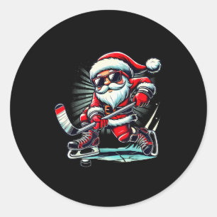 Lustiger Weihnachtsmann spielt Eishockey Liebhaber Runder Aufkleber