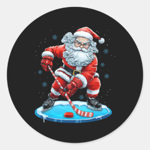 Lustiger Weihnachtsmann spielt Eishockey Xmas Spor Runder Aufkleber