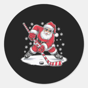 Lustiger Weihnachtsmann spielt Eishockey Xmas Spor Runder Aufkleber