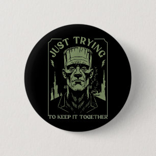 Lustiges Frankenstein-Monster, das versucht, zusam Button