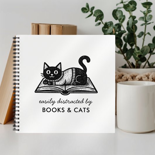 Lustiges leicht ablenkbar durch Bücher und Katzen 