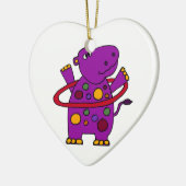 Lustiges lila Flusspferd, das Hula Band spielt Keramikornament (Links)