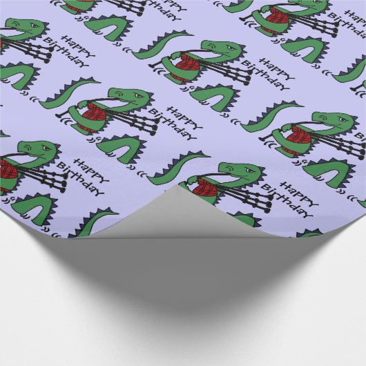 Lustiges Loch- Nessmonster, das Dudelsäcke spielt Geschenkpapier (Ecke)