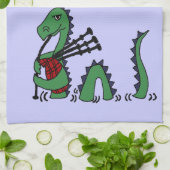 Lustiges Loch- Nessmonster, das Dudelsäcke spielt Geschirrtuch (Gefaltet)