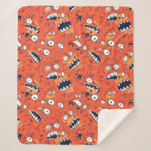 Lustiges orangefarbenes Monster mit schreiendem Ge Sherpadecke