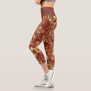 Luxuriöse Braun- und Goldkosmos Capri-Leggings Capri Leggings