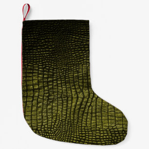 Luxuriöse dunkle Krokodillederstruktur. Kleiner Weihnachtsstrumpf