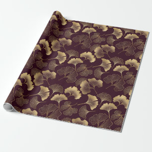 Luxuriöse goldene Ginkgoblätter auf tiefem Burgund Geschenkpapier