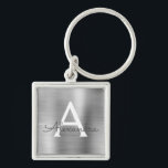 Luxuriöse Silber-Imitate Edelstahl-Monogramm Schlüsselanhänger<br><div class="desc">Luxuriöse Silber Imitate Edelstahl Metallic Eleganter Schlüsselanhänger. Diese Schlüsselanhänger können so angepasst werden,  dass sie Ihren Anfangs- und Vornamen enthalten. Diese Schlüsselketten machen Geburtstags-,  Brautparty- oder Junggeselinnen-Abschied-Favoriten großartig.</div>
