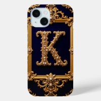 Luxuriöser Buchstabe K in ornamentaler goldener Ra