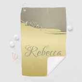 Luxuriöses goldenes Metall, das auf Gold und Silbe Golfhandtuch (Insitu)