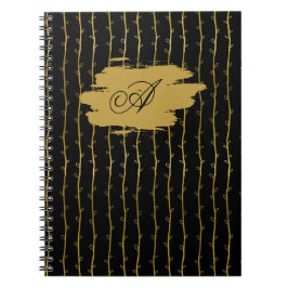 Luxuriöses schwarzes Notizbuch mit goldenem Blatt  Notizblock