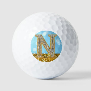 Luxus-Diamant-Buchstabe N auf goldenem Glitter-Hin Golfball