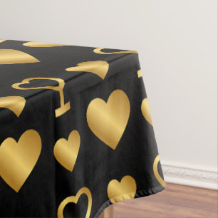 Luxus-Goldfolien-Herzen auf Schwarz Tischdecke