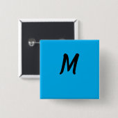 M auf einer blauen button (Vorne & Hinten)