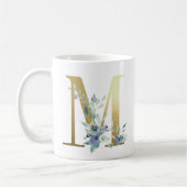 M, goldfarbener Erstling mit blauem Blumenblättern Kaffeetasse (Links)