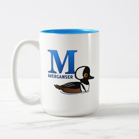 M ist für Merganser Zweifarbige Tasse (Links)