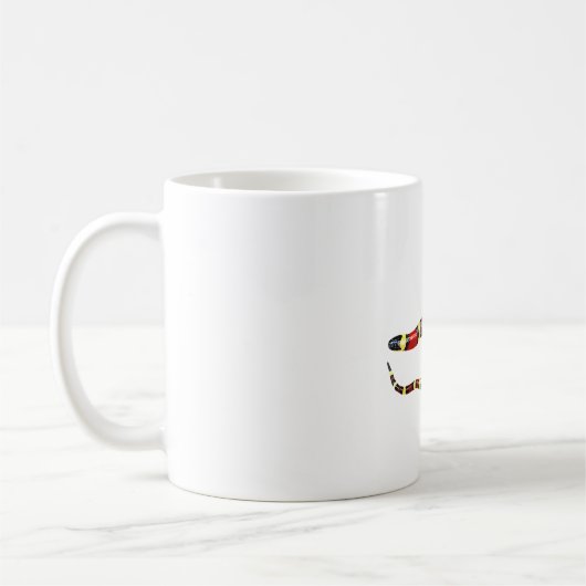 M ist für Milchschlange Kaffeetasse (Links)