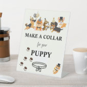 Machen Sie ein kurzes Zeichen, ein Welpenpfeifer Sockelschild (In SItu)